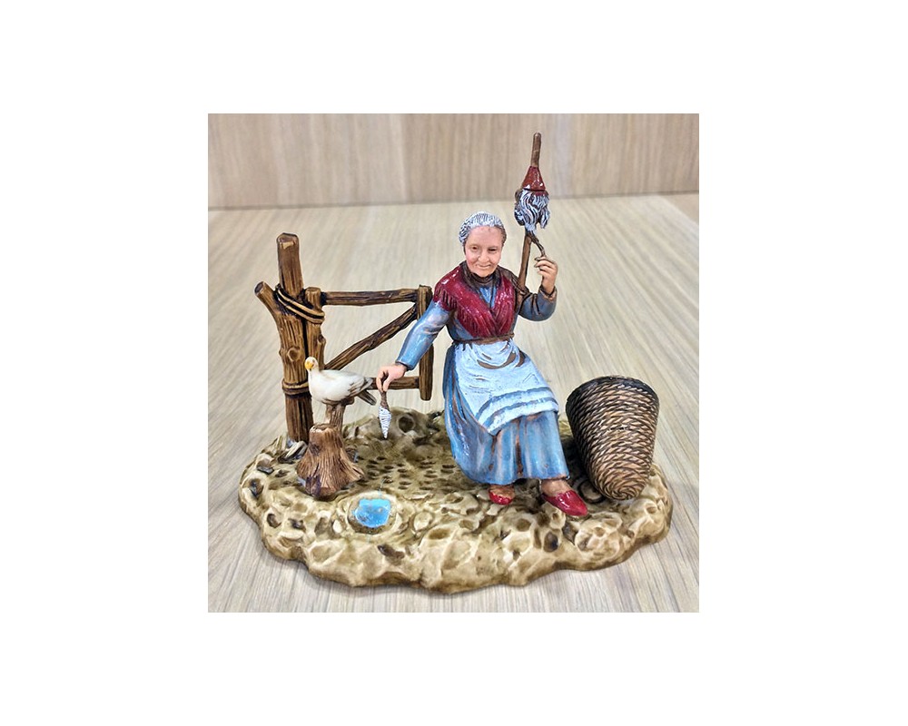 Ditta Montanini Gruppi Landi 1007-06 statuina vecchia con colomba